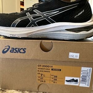 ASICS black sneakers. Good condition see photos
